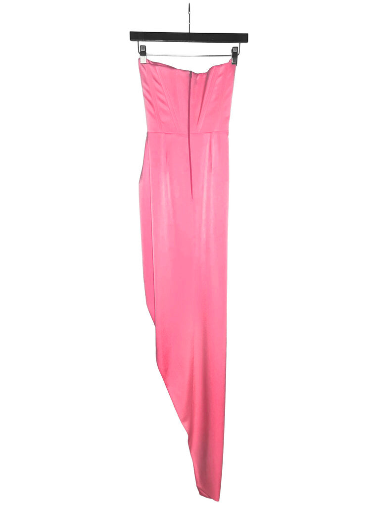 Back view of a bright pink strapless evening gown with a fitted bodice, concealed zip closure and dramatic asymmetric hem, available at Dee Black Luxury Designer Consignment Boutique, Perth Western Australia.