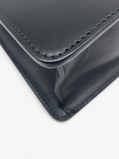 Detailed view of Gucci Sylvie black leather bag craftsmanship, highlighting structured edges, stitching and premium leather finish. From luxury designer consignment boutique Dee Black, in Perth Western Australila.