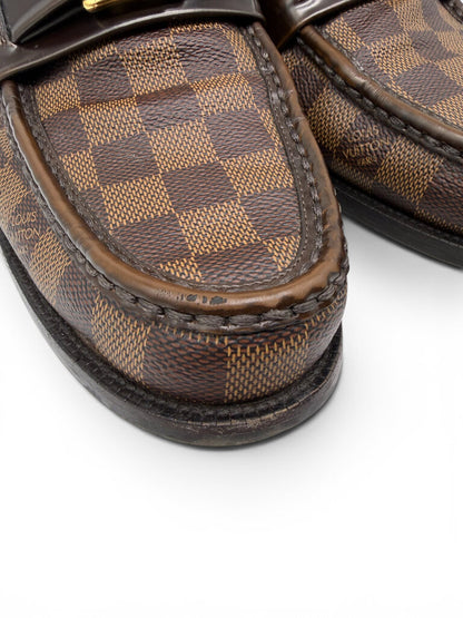 Detailed view of Louis Vuitton men's Damier Ebene loafer showcasing premium stitching, coated canvas and craftsmanship. From designer consignment boutique, Dee Black, in Perth, Western Australia. 