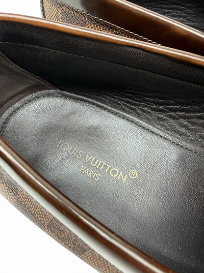 Detailed view of Louis Vuitton men's loafer interior with premium black leather footbed and embossed brand logo. From designer consignment boutique, Dee Black, in Perth, Western Australia. 