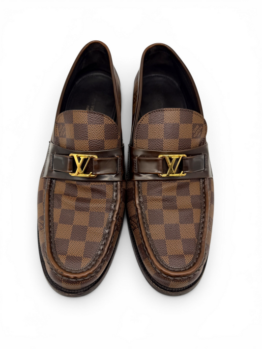 Men's designer loafers in brown checkered canvas with gold logo detail and classic slip-on silhouette, from Dee Black Boutique, Perth. 