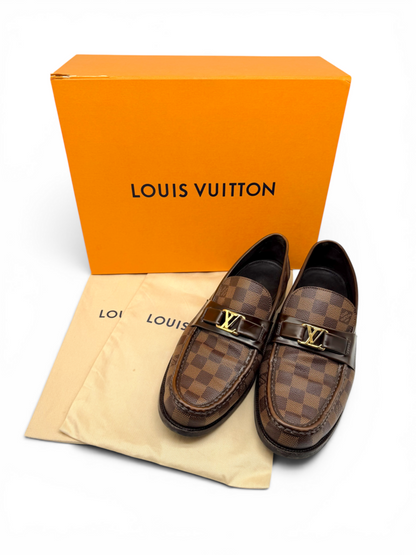 Louis Vuitton men's Damier Ebene loafers featuring gold LV detailing, presented with original box and dust bags. From Dee Black Designer Consignment Bouitque, Perth.