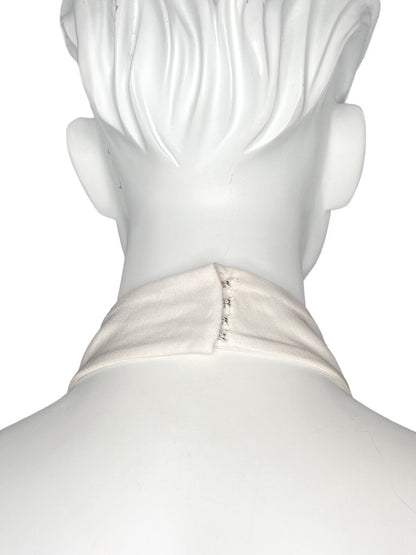Close-up of a Stella McCartney ivory halter neckline featuring a fabric-covered collar and hook-and-eye fastening detail, available at Dee Black Luxury Designer Consignment Boutique, Perth Western Australia.